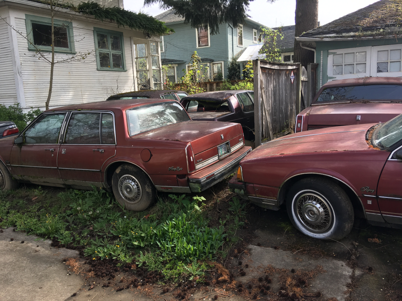 The proprietor of this backyard junkyard seems to have a particular affinity for Oldsmobiles